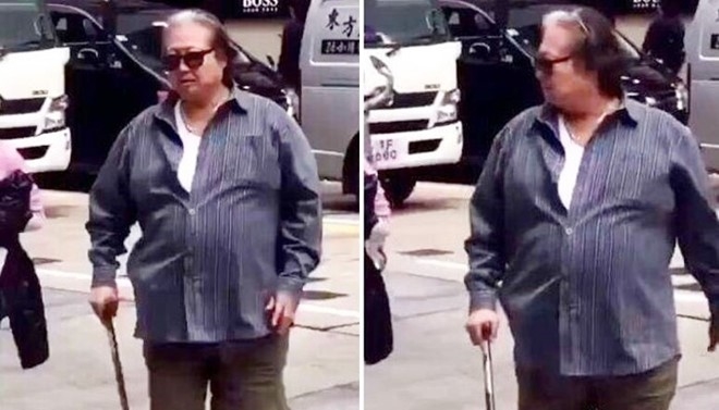 'Vua võ thuật' Hồng Kim Bảo đã phải chống gậy khi đi trên phố